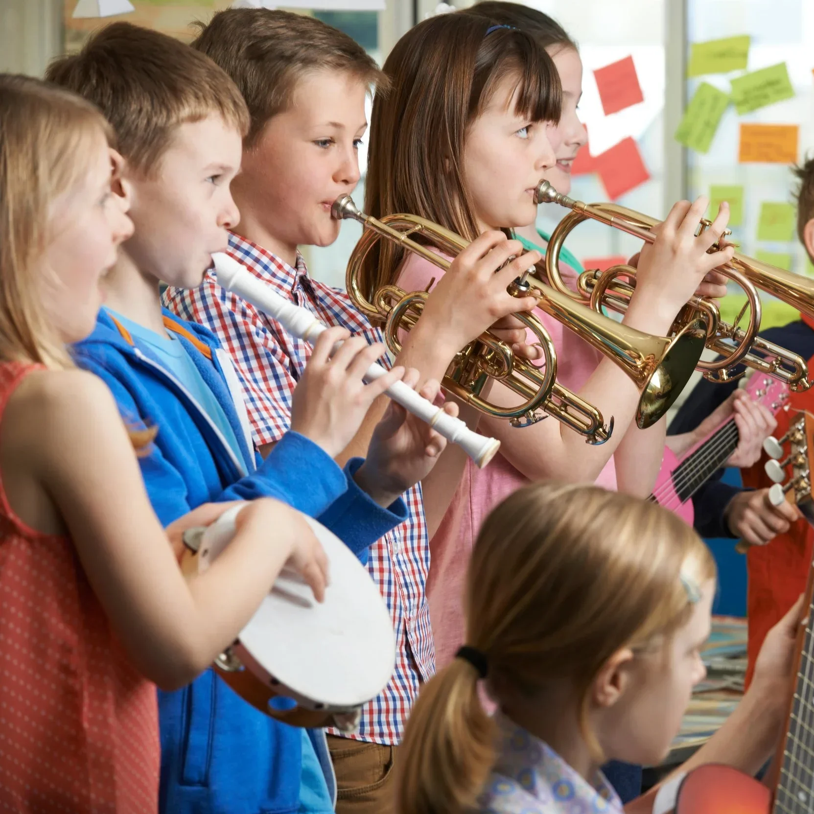 Students practice saxophone